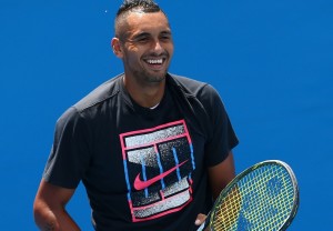 XXX of ZZZ plays a forehand in his/her first round match against XXXX of ZZZZ during day two of the 2016 Australian Open at Melbourne Park on January 19, 2016 in Melbourne, Australia.